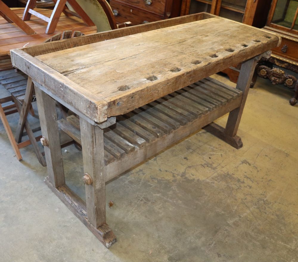A rustic work bench, W.144cm, D.62cm, H.83cm